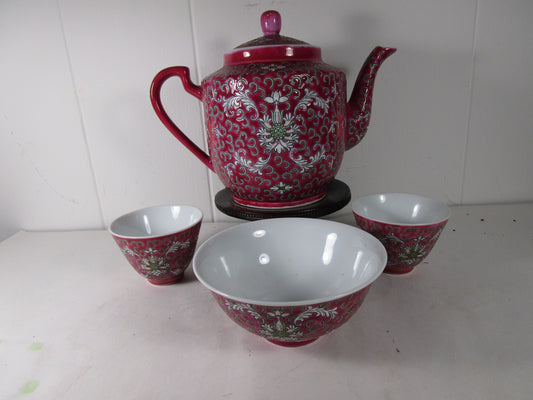 Teapot cups and Bowl deep pink/red color in the Rose Longevity pattern.